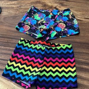 2 PAIRS GYMNASTICS DANCE SHORTS SIZE ADULT SMALL  NEON FLORAL AND NEON CHEVRON